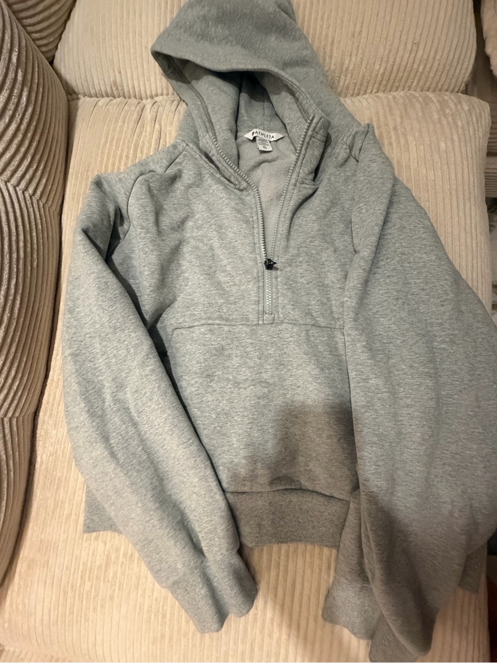 Athleta woman’s Gray Half-Zip Hooded Sweatshirt with Athleta embroidered on back